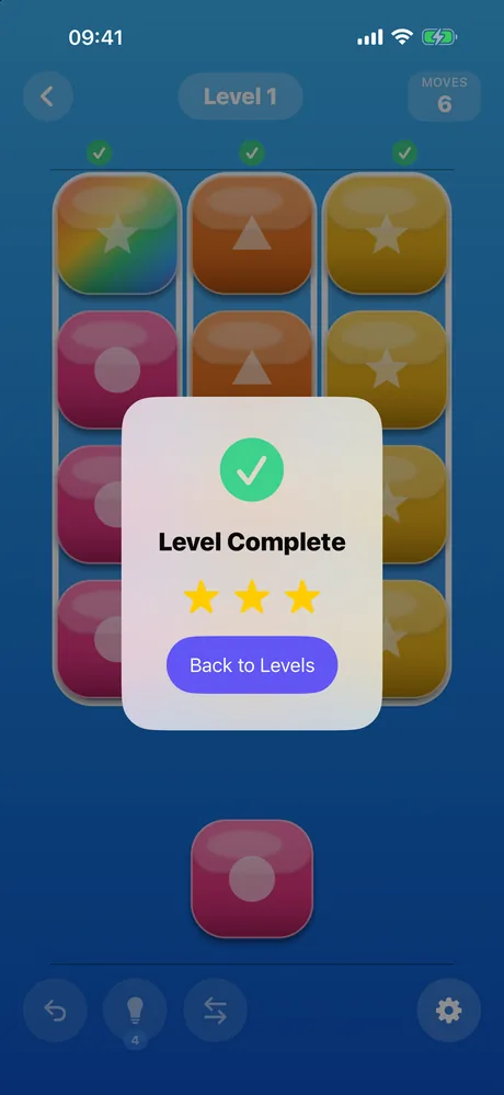 The Level Complete card, awarding three stars over a finished board.